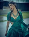 Mouni Roy's photoshoot in a bottle green lehanga