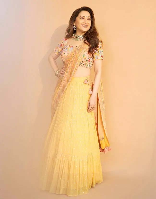 Madhuri Dikshit proves she is the timeless beauty in Bollywood in Yellow Peach embroidered lehenga, traditional look viral | Madhuri Dixit: കാലത്തിന് അതീതമായ സൗന്ദര്യം, മഞ്ഞ ലെഹങ്കയില്‍ മാധുരി ...