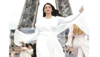 Aishwarya Rai at  Paris Fashion Week: വെള്ളയണിഞ്ഞ്   ഐശ്വര്യ റായ്,  പാരിസ് ഫാഷന്‍ വീക്കില്‍ തിളങ്ങി ലോകസുന്ദരി