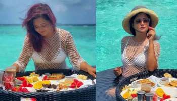 Rashmi Desai: തിരകളോട് സല്ലപിച്ച്‌  രശ്മി ദേശായി, white bikini photos വൈറല്‍...!!