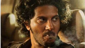 King Of Kotha : &#039;ചുണ്ടത്ത് ഒരു സിഗരട്ടും ആ രൂക്ഷ നോട്ടവും&#039;; ദുൽഖറിന്റെ &#039;കിങ് ഓഫ് കൊത്ത&#039;യുടെ ഫസ്റ്റ് ലുക്ക്