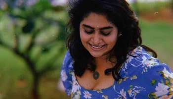 Nimisha Sajayan : നീല ഫ്രോക്കിൽ സുന്ദരിയായി നിമിഷ സജയൻ; കാണാം ചിത്രങ്ങൾ