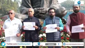 Opposition MPs Protest infront of Gandhi statue