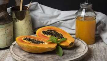 Papaya Benefits: വെറുംവയറ്റിൽ പപ്പായ കഴിക്കാമോ? ഇത് ആരോ​ഗ്യത്തിന് ​ഗുണമാണോ ദോഷമാണോയെന്ന് അറിയാം