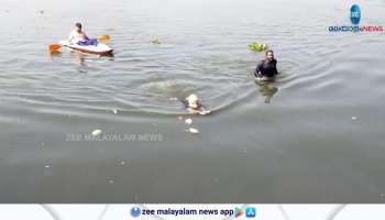 12 year old girl put record after swim over Vembanattu lake with tied leg and hand