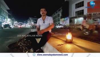 Protest by burning lanterns to illuminate the street lights in Pathanapuram