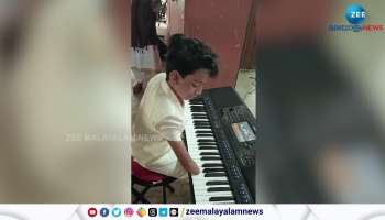 this sixth standard student playing keyboard without hands