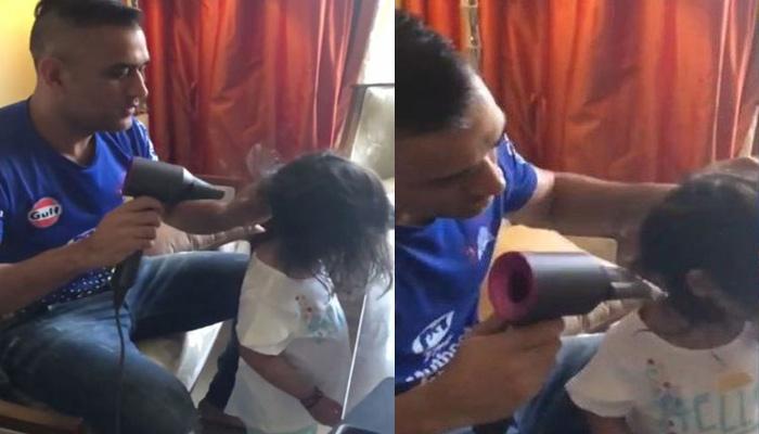 VIRAL: ഹെയര്ഡ്രൈയര് ഉപയോഗിച്ച് സിവയുടെ തലമുടി ഉണക്കുന്ന ധോണി VIRAL: ഹെയര്ഡ്രൈയര് ഉപയോഗിച്ച് സിവയുടെ തലമുടി ഉണക്കുന്ന ധോണി