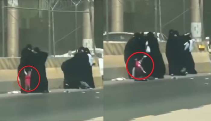 Viral Video: റോഡരികില് പര്ദ്ദയിട്ട സ്ത്രീകളുടെ കൂട്ടത്തല്ല്! Viral Video: റോഡരികില് പര്ദ്ദയിട്ട സ്ത്രീകളുടെ കൂട്ടത്തല്ല്!