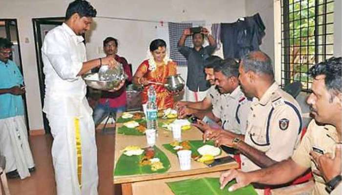 വിവാഹ ശേഷം സ്റ്റേഷനിലെത്തി പോലീസുകാര്‍ക്കൊപ്പം സദ്യയുണ്ട്   വധൂവരന്മാര്‍....