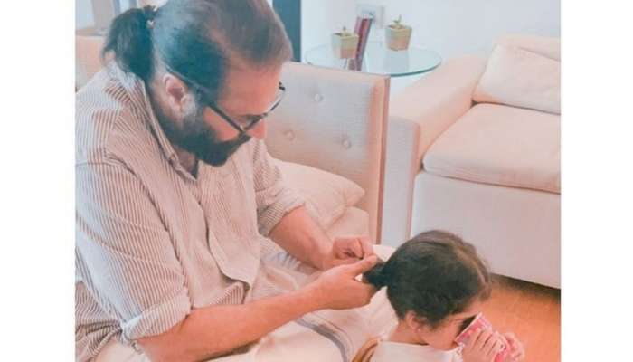 Father's Day : Mammootty കൊച്ചു മകൾ മറിയത്തിന് മുടി കെട്ടി നൽകുന്നു, ചിത്രത്തിനൊപ്പം താരത്തിന്റെ ലുക്കും വൈറൽ