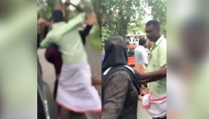 Policeman beats woman: ഇടുക്കിയിൽ നടുറോഡിൽ സ്ത്രീയെ മർദിച്ച് പൊലീസുകാരൻ