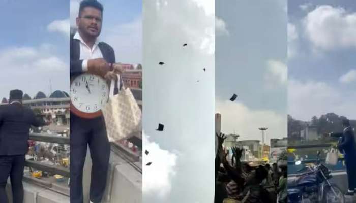 Viral Video : ബെംഗളൂരുവിൽ ഫ്ലൈ ഓവറിന്റെ മുകളിൽ നിന്ന് നോട്ടുകൾ വാരിയെറിഞ്ഞ് യുവാവ്; ട്രാഫിക് ബ്ലോക്കിൽ പെട്ട് നഗരം