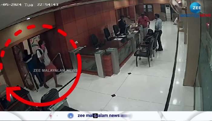 CCTV footage of geni ninan arriving at hotel with blue trolley bag outside